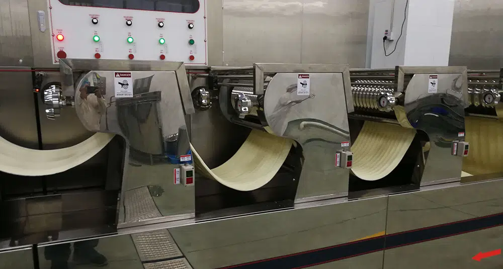 gradual thinning process in noodle production machine